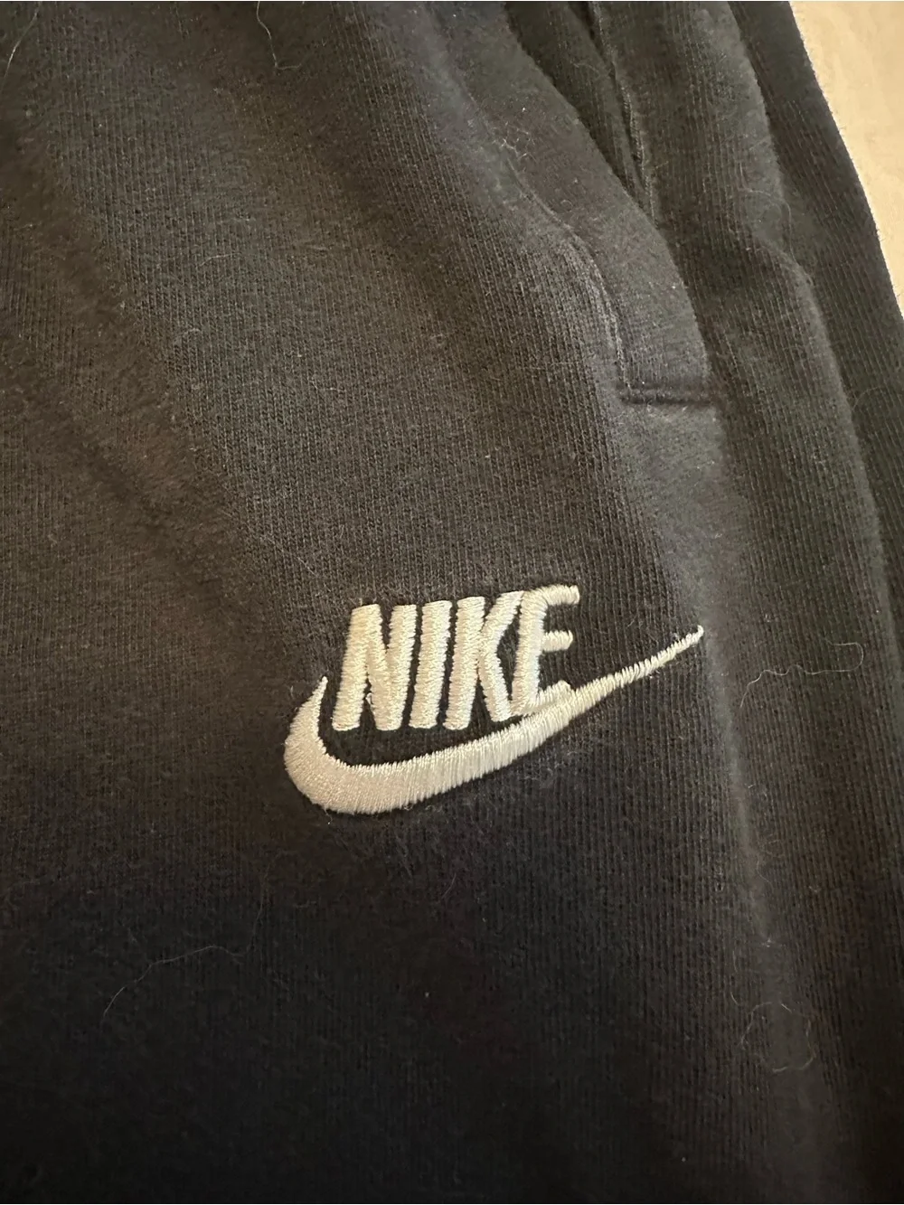 Nike Black Jogger Sweatpants with White Swoosh